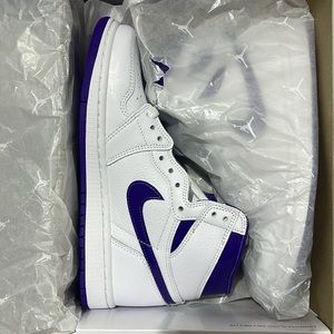 Women Air Jordan 1 High OG in white and purple.